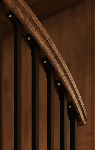 American Industrial spiral staircase wood handrail detail