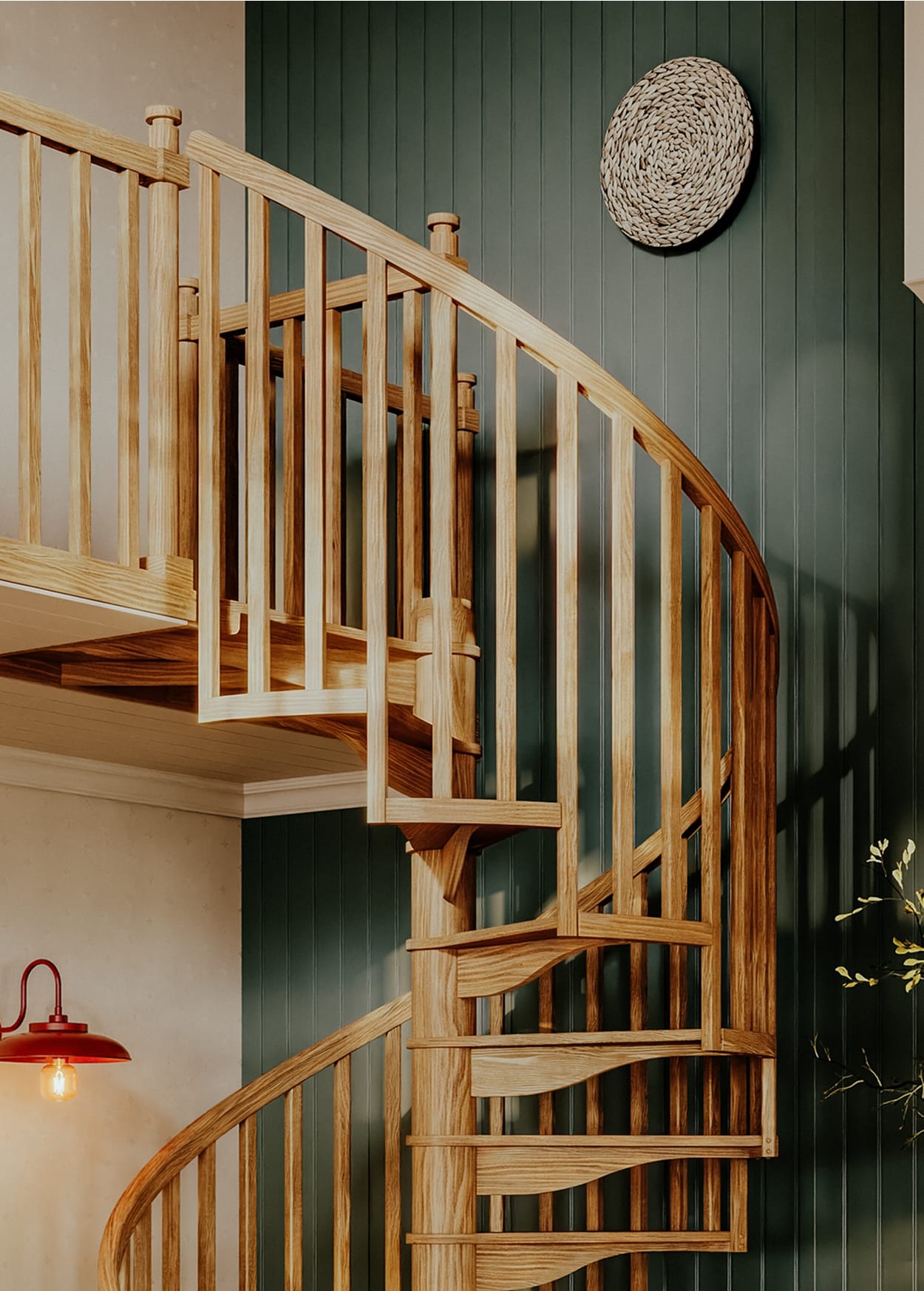 Carpenter spiral staircase with oak spindles and handrail curving down from the loft landing