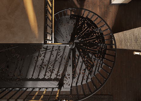 Victorian spiral staircase with ornamental treads in a scroll pattern, viewed from above